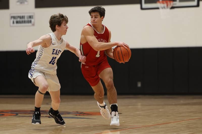 Hinsdale Central’s Evan Phillips looks to pass against Lincoln-Way East in the Lincoln-Way West Warrior Showdown on Saturday January 28th, 2023.