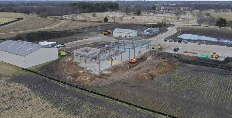 An aerial view showing crews building the exterior shell of the Dr. Alfred E. Wisgoski Agricultural Education Center on Tuesday, Jan. 13, 2026 on the southern end of the  Illinois Valley Community College campus in Oglesby. Last August, IVCC officially broke ground on the $7.6 million Dr. Alfred E. Wisgoski Agricultural Education Center. The 10,250-square-foot facility is expected to open in 2027. The project is supported by a $3.5 million grant from the U.S. Department of Economic Development Administration, a $240,000 grant from the Illinois Department of Commerce and Economic Opportunity and a $1 million gift from the Wisgoski family.