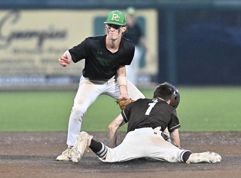 Providence Jackson Smith tags Mt. Carmel's Kevin Zanin at second base during the Class 4A Super-Sectional game on Monday, June 03, 2024 at Crestwood.