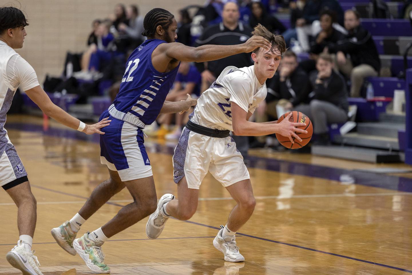 Dixon’s Bryce Feit looks to pass Tuesday, Dec. 13, 2022 against Plano’s Jaylen Barber.