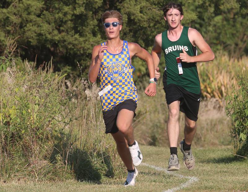 Somonauk-Leland's Caden Hamer, and St. Bede's Devin Steil, race during the Ottawa Nautical Mile Relay on Tuesday, Sept. 2, 2025 at Catlin Park in Ottawa.