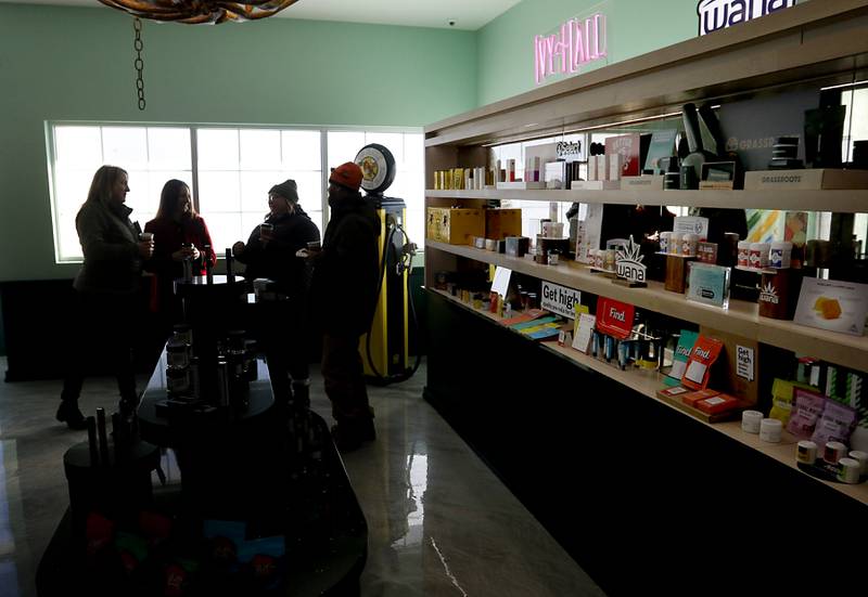 People talk as they explore the new Ivy Hall Crystal Lake, a social equity-licensed cannabis dispensary during an open house on Thursday, Feb. 2, 2023, at 501 Pingree Road in Crystal Lake.