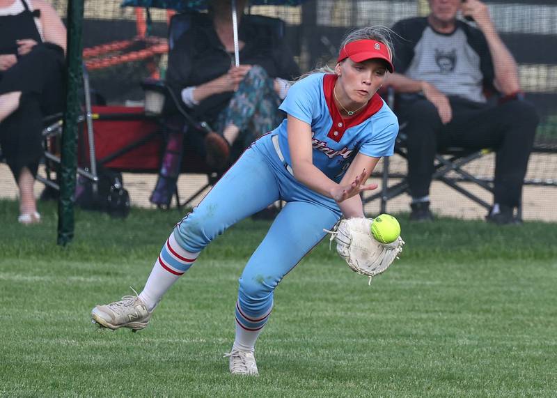 Ottawa's Addy Miller fields a ball on a bounce in right field Monday, May 12, 2025, during their game at Sycamore High School.