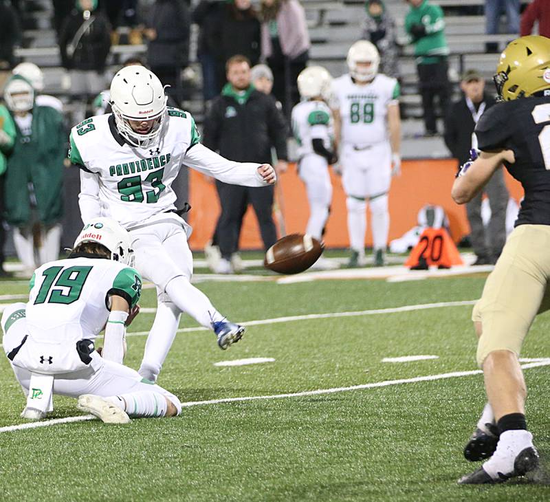 Providence Catholic's Joe Ciaccia (83) kicks a field goal as teammate Mason Straight (19) holds in the Class 4A state title on Friday, Nov. 25, 2022 at Memorial Stadium in Champaign.