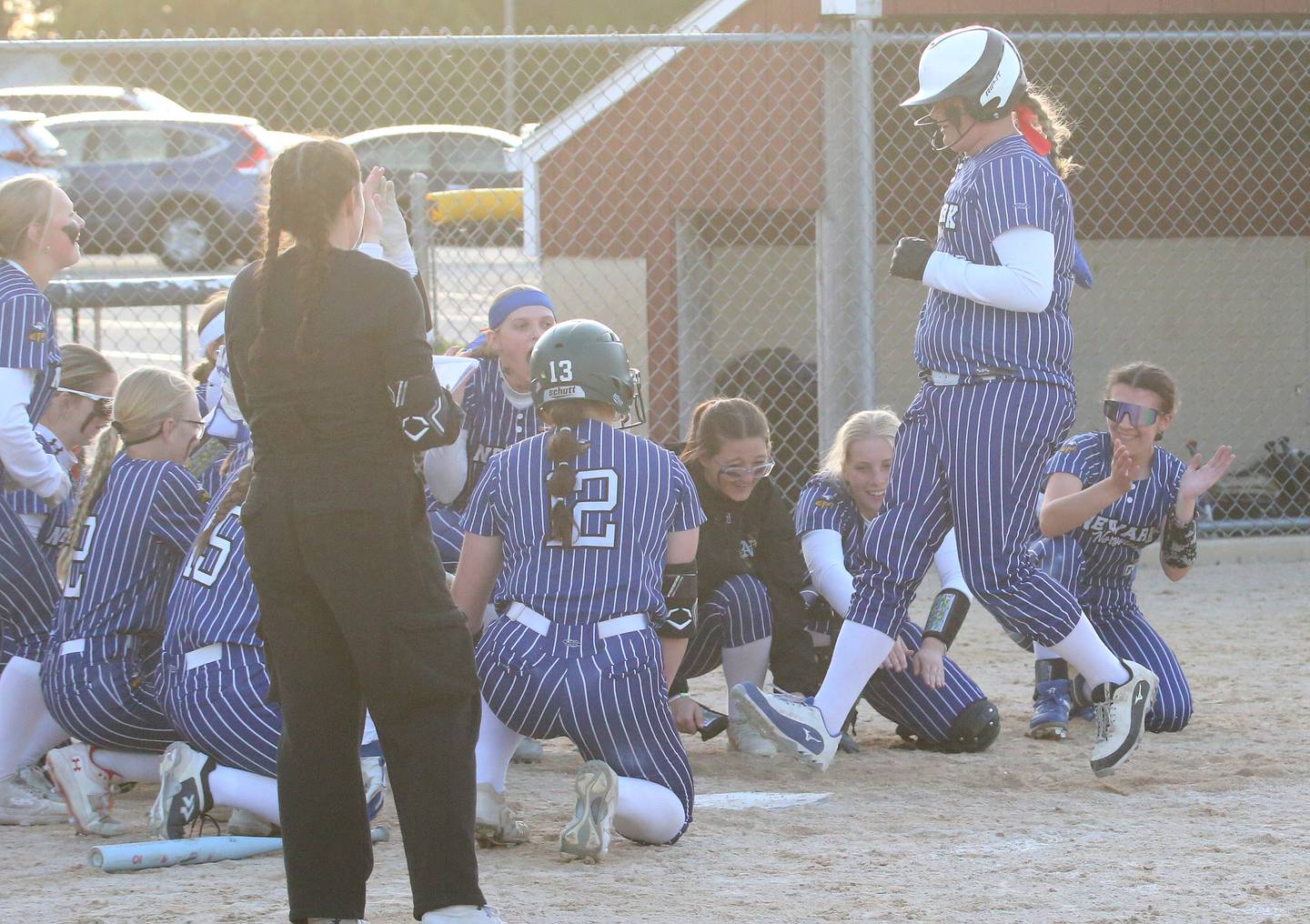 Newark's Kate Bromeland crosses home plate after hitting a home run against Earlville during the Class 1A Regional final on Thursday, May 22, 2025 at Indian Creek High School in Shabbona.