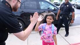 Photos: DeKalb students arrive for first day of school at Gwendolyn Brooks Elementary School