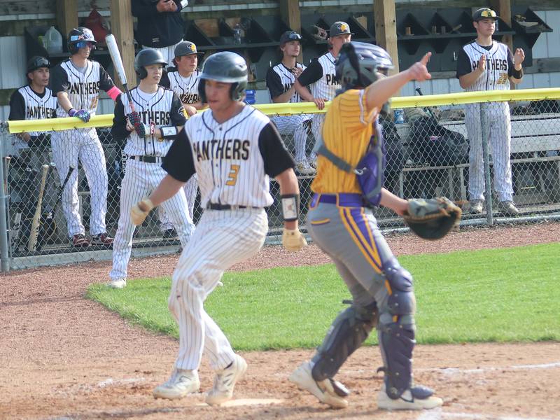 Putnam County's Johnathon Stunkel steps on home plate to score the teams first run on Friday, May 8, 2026 at Putnam County High School.