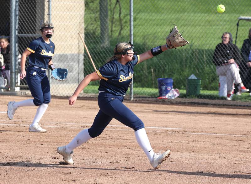 Sterling's Sienna Stingley tries to catch a soft liner back to the mound during their game against Sycamore Tuesday, May 14, 2024, at Sycamore High School.