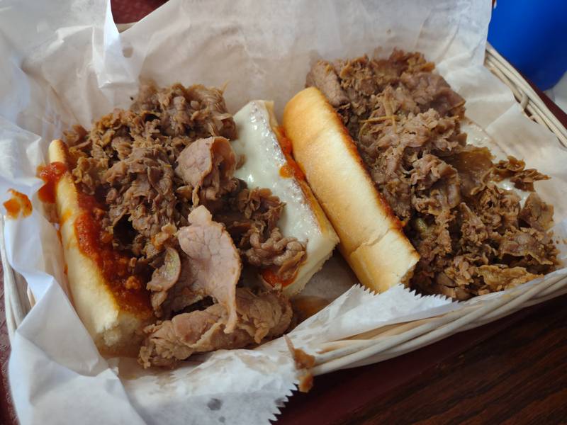 The Italian beef on garlic bread at Corleone's in Morris is served with meat sauce and cheese.