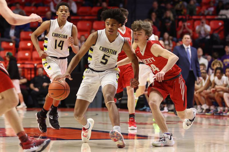 Yorkville Christian’s Tyler Burrows works the ball against Liberty in the Class 1A championship game at State Farm Center in Champaign. Friday, Mar. 11, 2022, in Champaign.