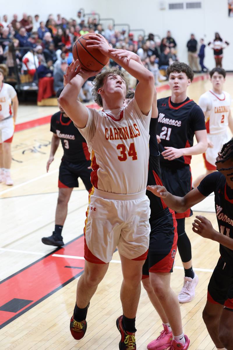 St. Anne's Jason Bleyle goes for a layup during St. Anne's 64-43 victory over Momence in the River Valley Conference semifinals on Tuesday, Feb. 10, 2026.