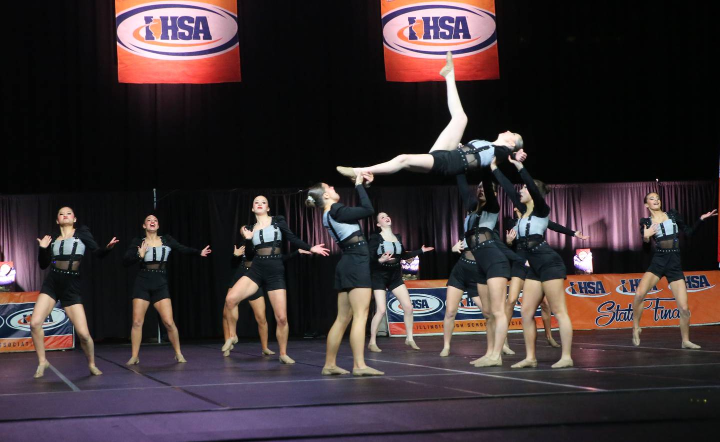 Members of the Benet Academy dance team perform during the IHSA State Dance finals on Saturday, Feb. 1, 2025 at Grossingers Motor Arena in Bloomington.