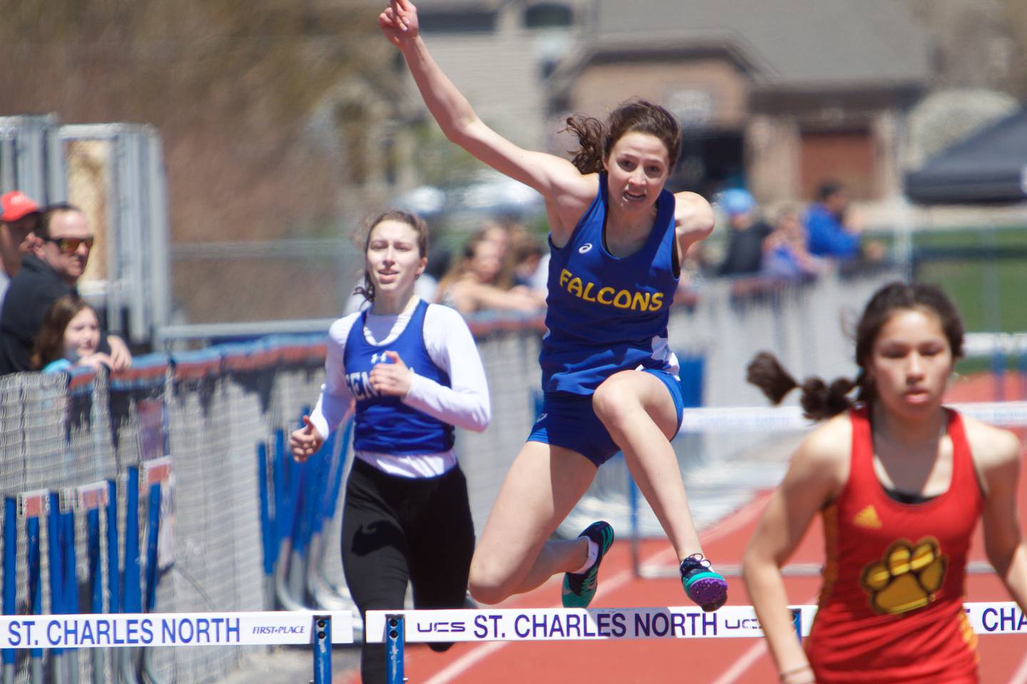 Wheaton North's Grace Gillmar competes in the 300 Meter Hurdles at the DuKane Girl's Conference meet at St. Charles North on May 7, 2022 in St. Charles.