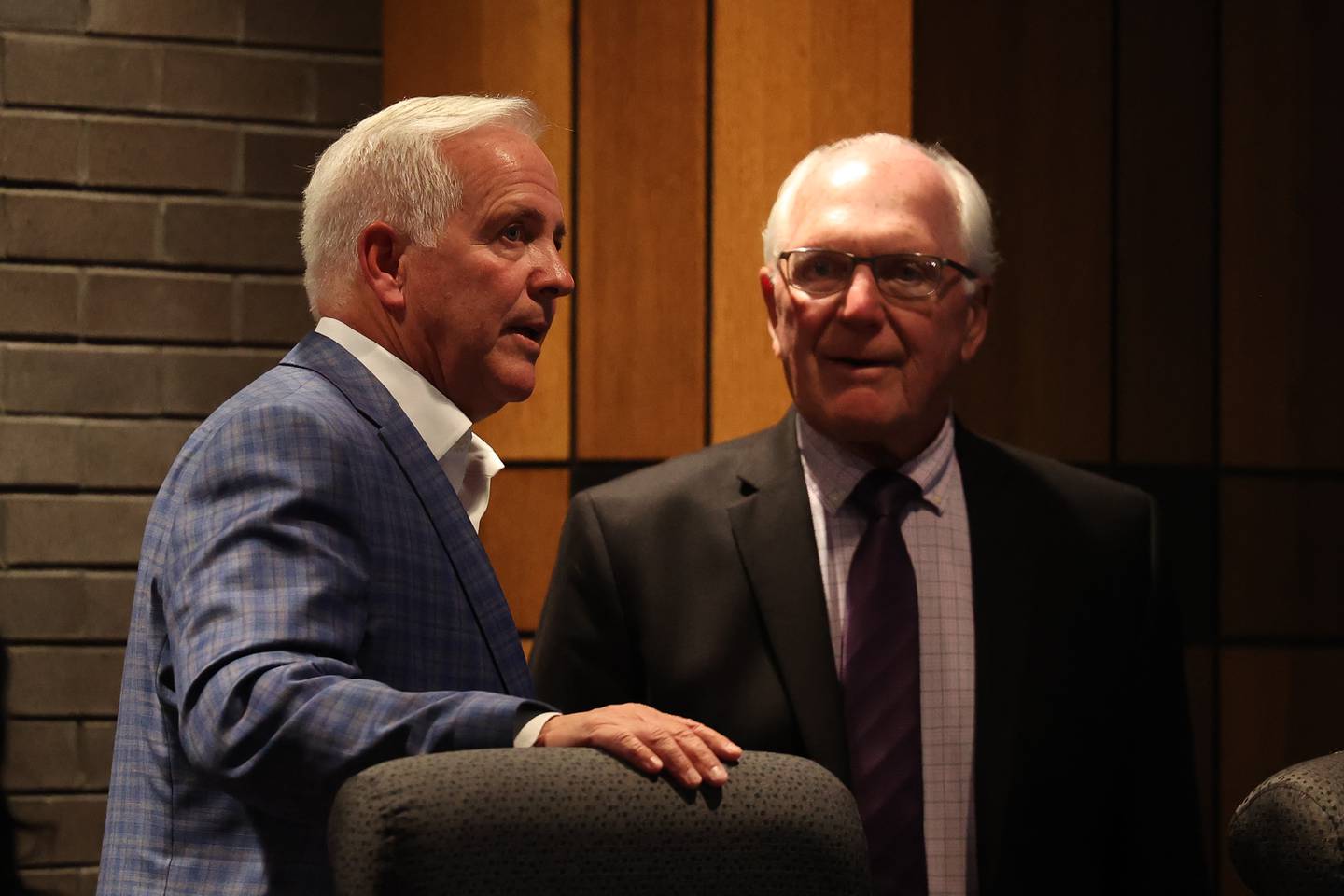 Mayor Terry D’Arcy speaks with Joliet City Council member Pat Mudron before the Joliet City Council meeting on Tuesday, July 18th, 2023.