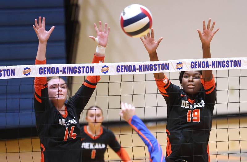 DeKalb players go up for a block during their game Wednesday, Sept. 11, 2024, at Genoa-Kingston High School.