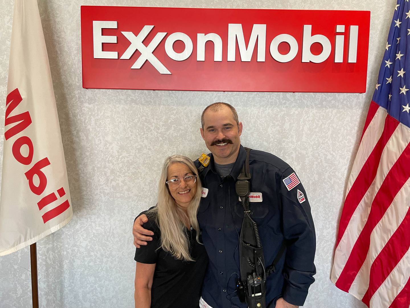 Jeannie Myers (left) and her son Pete Wheeler pose at the ExxonMobil plant in Joliet on Thursday, Sept. 8, 2022. Pete’s wife Ashlee and his sister-in-law both work at the refinery as well. On his deathbed, Jeannie Myers' father told her to work at the refinery, even though she had a long teaching career.