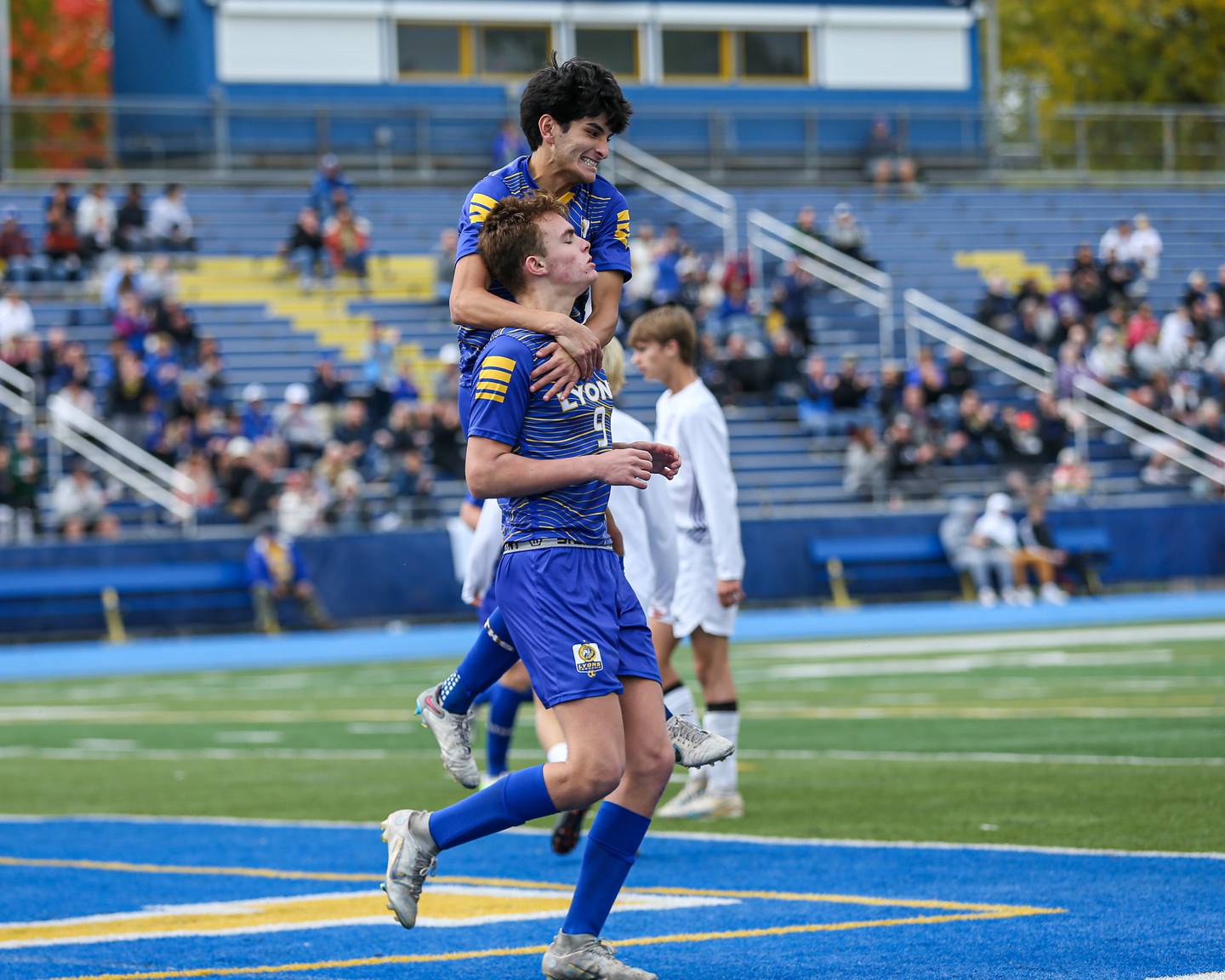 Lyon's Owen Suda (5) celebrates with Austen Wisniewsk (5) after heading in a goal during Class 3A Lyons Regional final soccer match.  Oct 21, 2023.