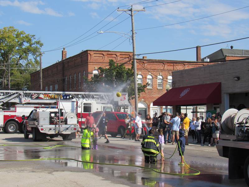 Kids compete in the kiddie water fights at the Grundy County Corn Festival.