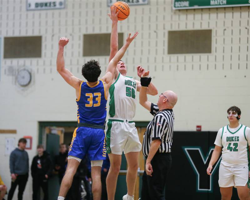 York's Hunter Stepanich (50) tips off in overtime during their basketball game between Lyons at York. Jan 10, 2025 in Elmhurst.