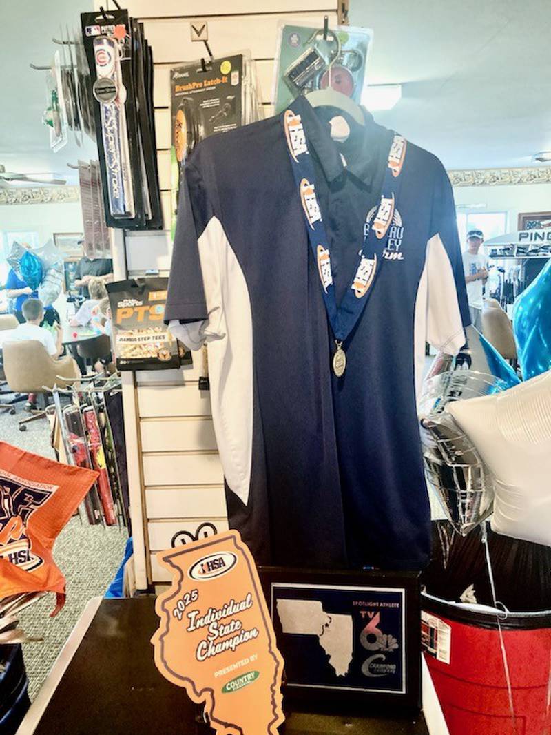 A collection of Wyatt Novotny's state tournament hardware and uniform were on display at his open house at Wyaton Hills Golf Course on Saturday.