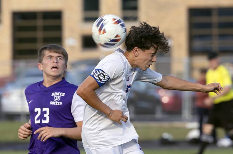 Genoa-Kingston’s Ayden Hernandez goes up for a header against Dixon’s Cameron Foulker Tuesday, Sept. 2, 2025.
