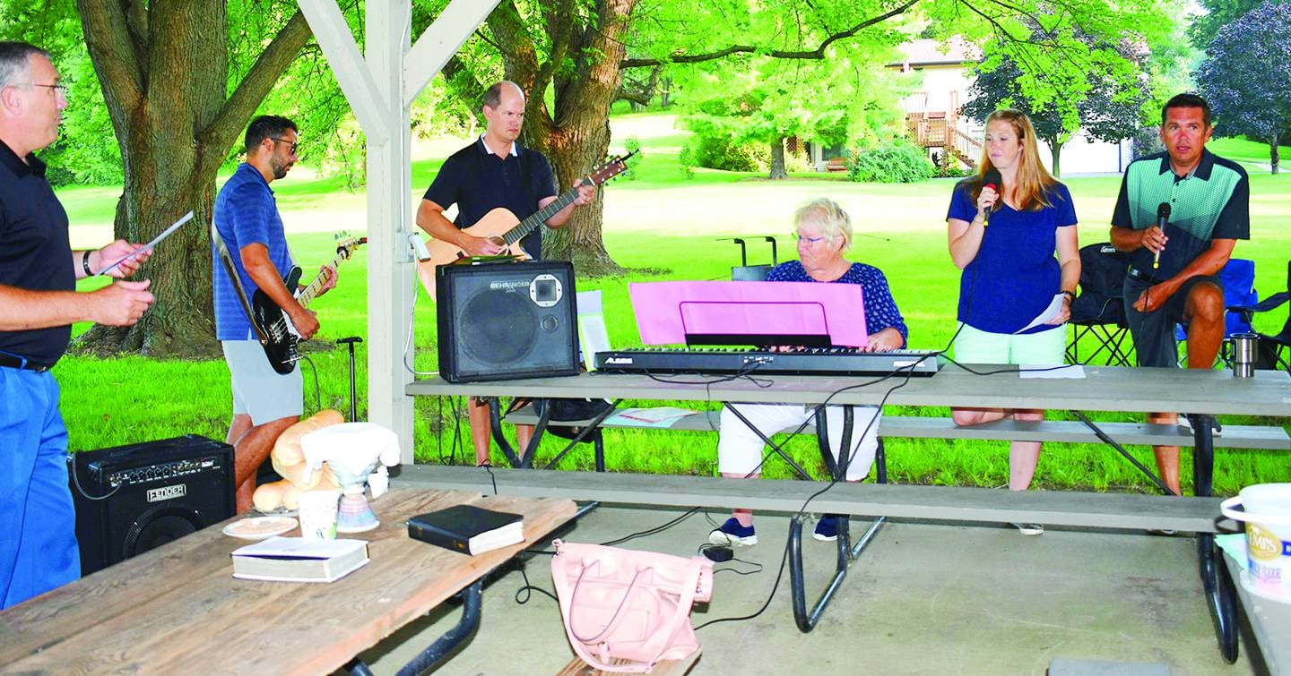 The playing of comtemporary Christian music from Bethel United Methodist Church in Shannon's Praise Band is a highlight during Church at the Lake sermons at Lake Carroll. During a service in August 2018, pictured here, the quintet of musicians consisted of Jason Mlakar (second from left), Jeff Norton, Deb Endress, Erin Deets and Mark Gassman.