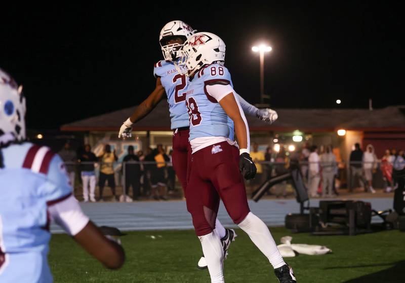 Kankakee's Ezekiel Sherrod (2) celebrates his touchdown with teammate Kendrick Crite during Kankakee's 33-12 loss to Nazareth on Friday, Aug. 29, 2025.