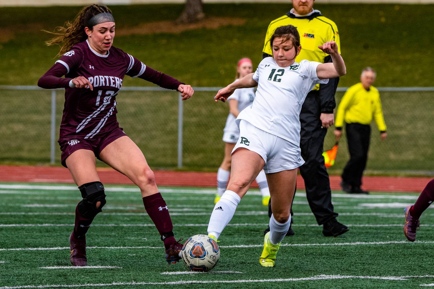 Providence Catholic's Maggie Wolniakowski and Lockport's Emma Verdon fight for possession of the ball during a game  Thursday March 30, 2023 at Lockport East High School