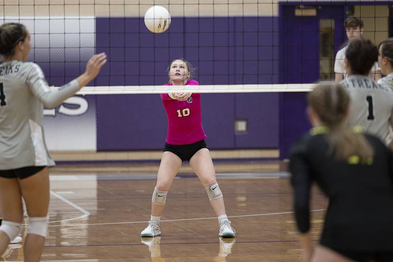 Dixon’s Natalie Davidson passes a shot Thursday, Oct. 27, 2022 in the volleyball regional final against Galesburg.