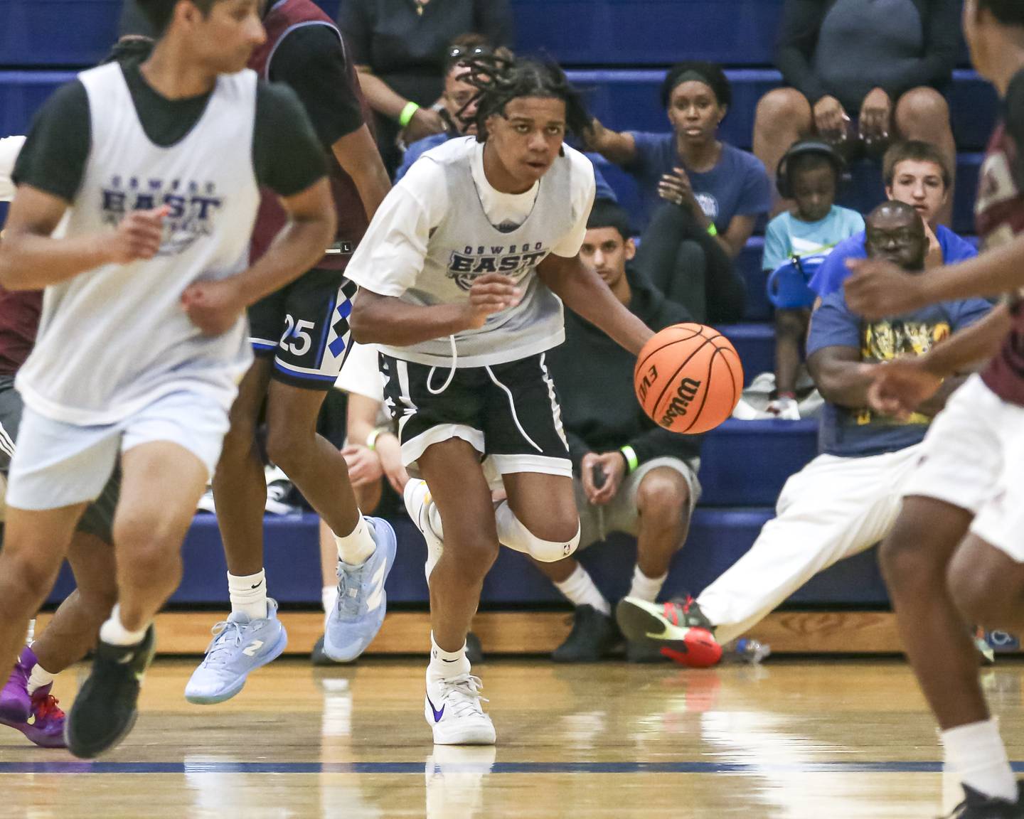 Oswego East's Mason Lockett (12) races down the court  in their Riverside-Brookfield Shootout basketball game.  June 20, 2025 in Riverside.