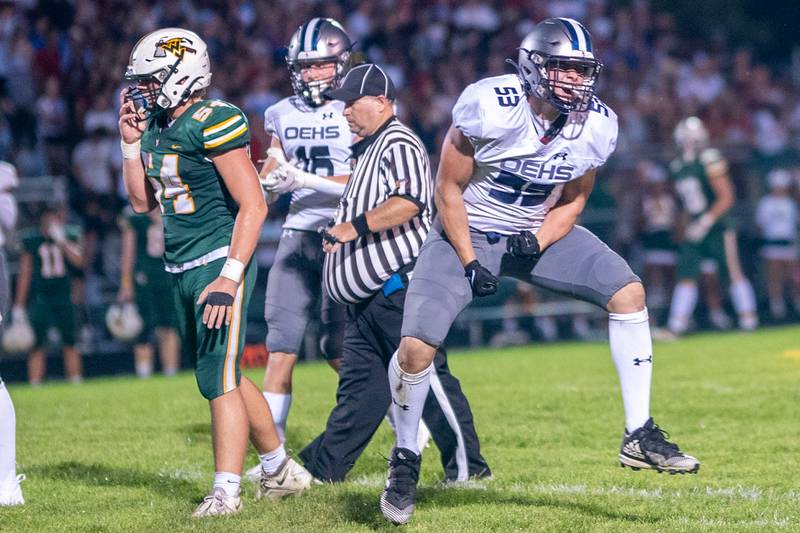Oswego East's Blaise Chin (53) reacts after a defensive stop against Waubonsie Valley during a football game at Waubonsie Valley High School in Aurora on Friday, Aug. 25, 2023.