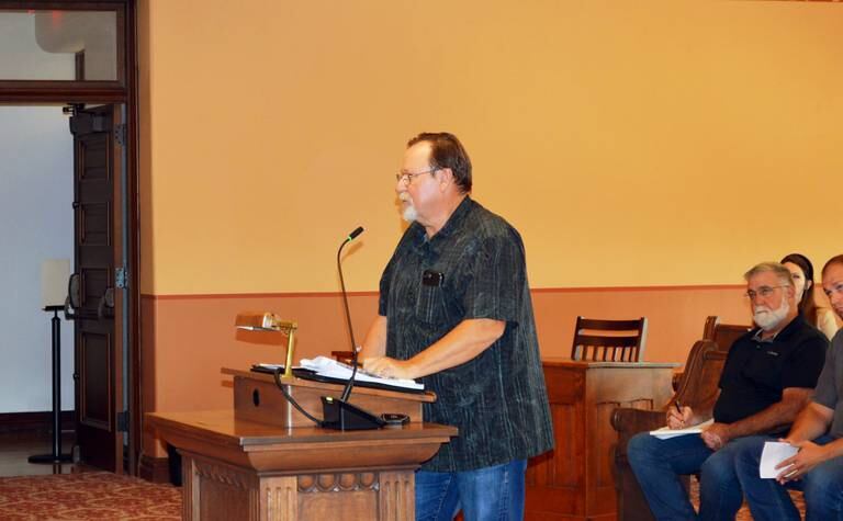Tim Kaffenbarger, of rural Byron, testifies before the Ogle County Zoning Board of Appeals on July 25, 2024, in opposition of Constellation Energy Generation's request to rezone 524 acres of land around the Byron Generating Station. Kaffenbarger worked at the plant for 18 years and lives a couple miles from the plant.