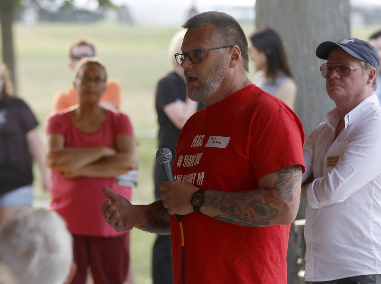 Paul Gurns speaks Wednesday, June 28, 2023, during a Stop the Pit Town Hall meeting at Veterans Park in McHenry. Over 150 people attend the town hall meeting to learn and voice their concerns about a proposed sand and gravel mining operation near McHenry.