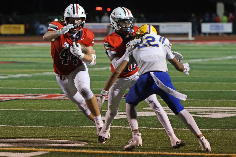Bradley-Bourbonnais' Calvin Kohl, left, runs after the catch while Boilermaker teammate Keshawn Tucker blocks a Crete-Monee defender during a game at Bradley-Bourbonnais Saturday, Sept. 6, 2025.