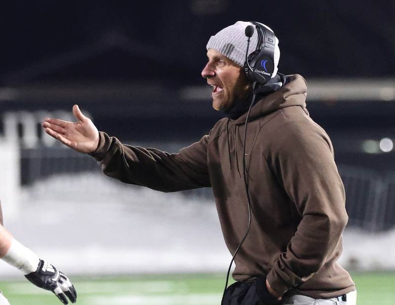 Mount Carmel head coach Jordan Lynch questions an official Wednesday, Dec. 3, 2025, during the IHSA Class 8A state chamionship game in Huskie Stadium at Northern Illinois University in DeKalb.