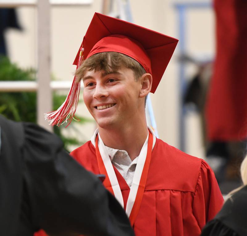 Oregon High School graduate Keaton Salsbury greets faculty members during the Class of 2026 commencement ceremony on Sunday, May 24, 2026.
