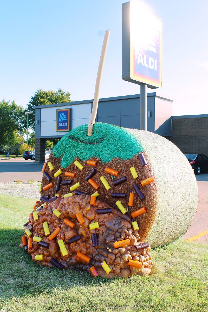 Some caramel on your apple: Aldi took a wood pole and large amounts of foam to create a caramel apple. The bale was part of the 2025 Hay Bale Trail in Rochelle throughout October.
