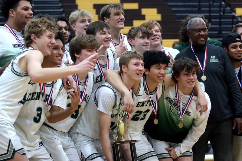 Grayslake Central celebrates a 56-51 win over Crystal Lake South in Hinkle Holiday Classic Basketball Tournament title game action at Jacobs High School Friday.