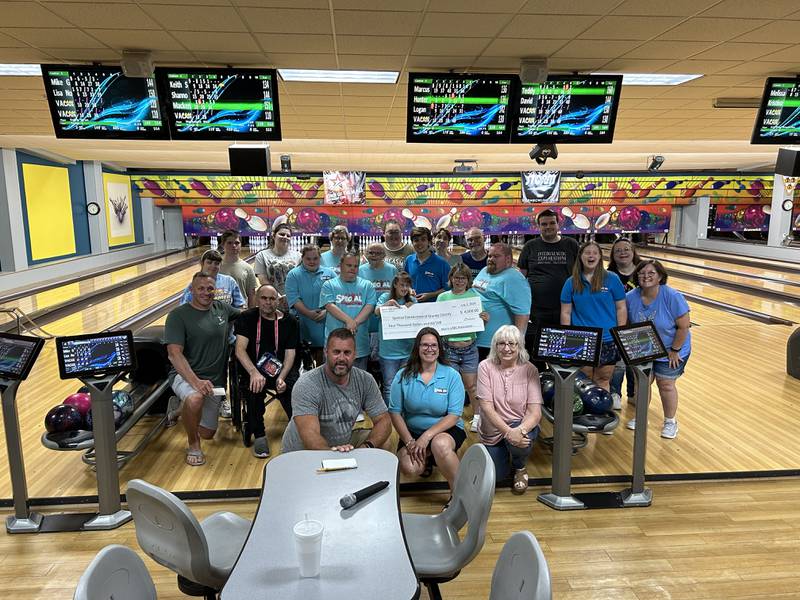 From left to right starting with the back row: Logan Boyle, Jaidyn Shannon, Katie Lovell, Mackenzie Blair, Lisa Nowack, Mike Gaertig, Teddy Morrison, Kristina Boudreau.
Third row: Taryn Sheedy, Shannon Wexell, Judy Stangland, Marcus Bennett, David Taylor, Hunter Gill, Melissa Hackett.
Second row: Greg Butterfield, President of the Morris Bowling Association, Bruce Laymon, Keith Siron, Christina Kluzek, Marin Lock.
Front row: Jake Duvick, Vice President of the Morris Bowling Association, Tina Nall Special Connections of Grundy County's Special Olympics Program Coordinator, Deidre Hicks, Morris Bowling Association Manager.