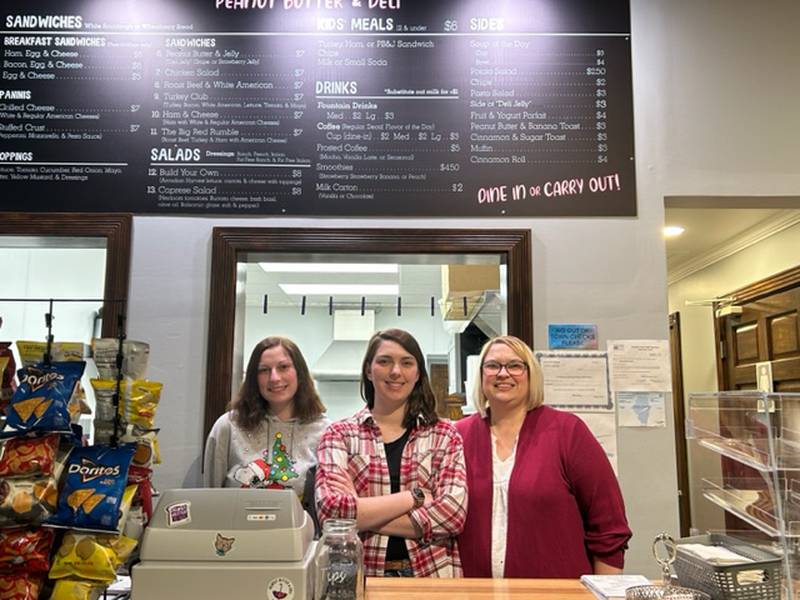 (From left) Landri, Gracen and Jamie Harmon are shown in their new restaurant, Peanut Butter & Deli, in downtown Morrison.