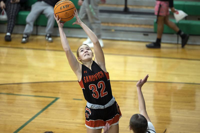 Sandwich’s Khloe White pulls in a pass against Rock Falls Tuesday, Nov. 26, 2024, at Rock Falls High School.