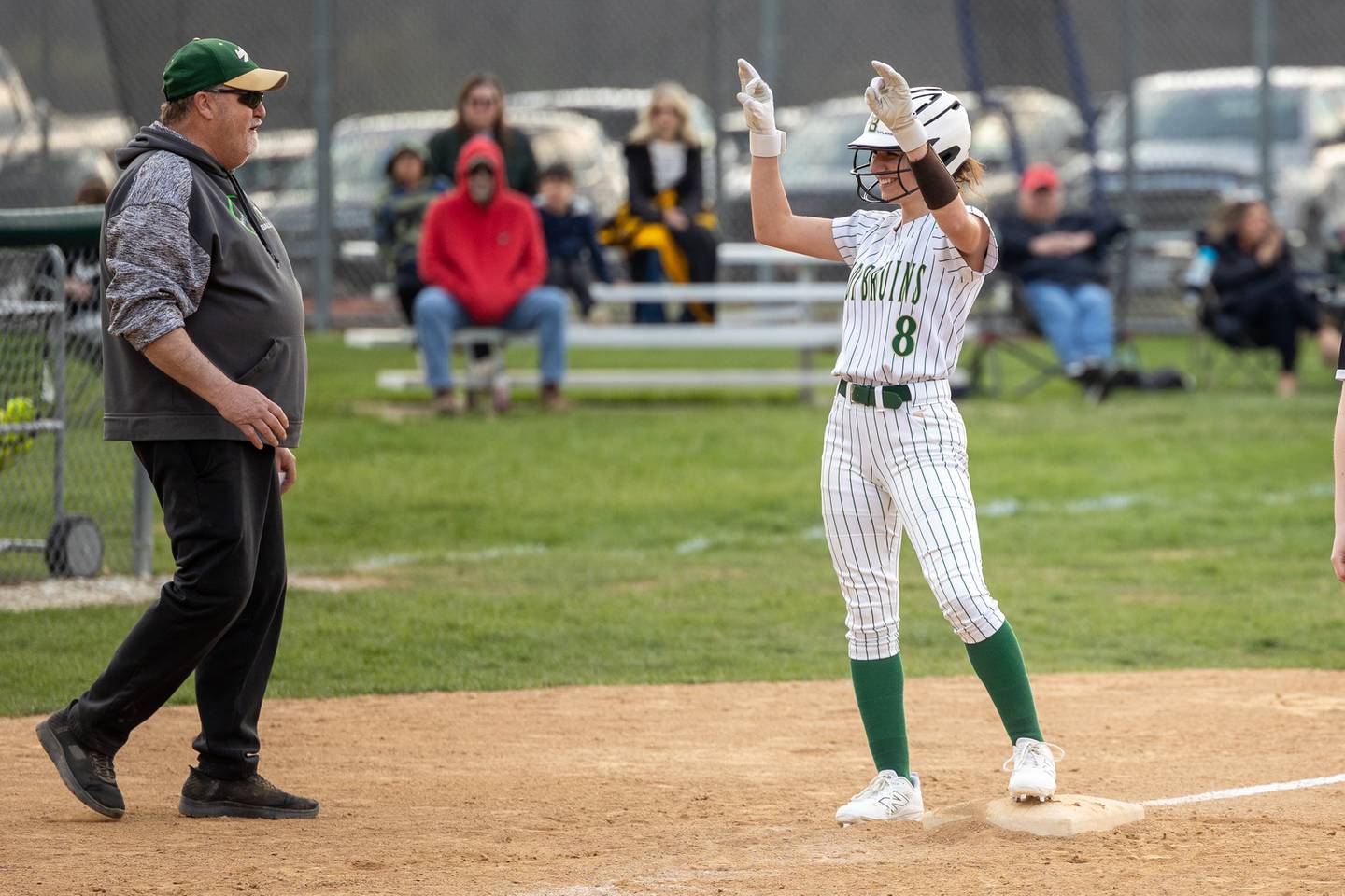 Lily Bosnich (8) of St. Bede celebrates after getting on third base on Thursday, April 10, 2025 at St. Bede High School in Peru.
