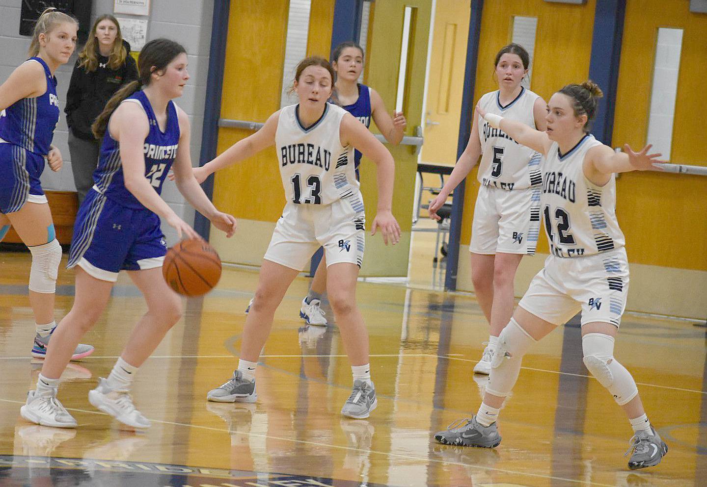Princeton's Camryn Driscoll sizes up the Bureau Valley defense in the second half of Thursday night's game at the Storm Cellar. Driscoll hit the game-winning shot for a 54-52 PHS win.