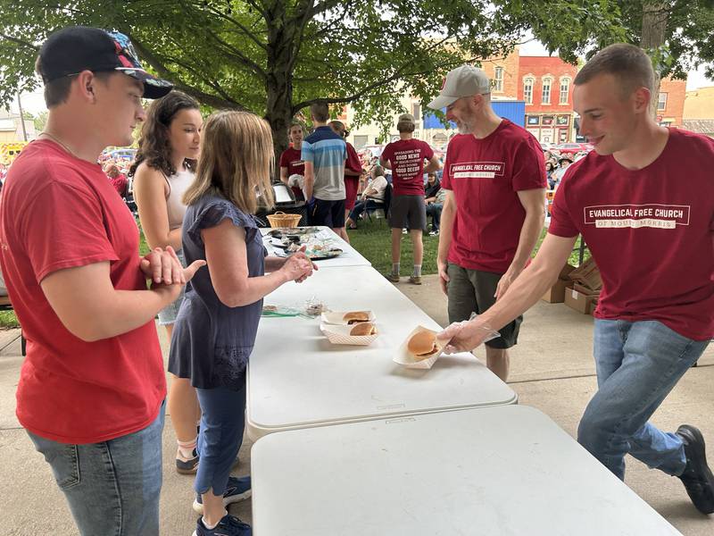 Members of the Evangelical Free Church served sandwiches, cole slaw and chips during the RIck Lindy Tribute to Roy Orbison on the opening night of the 2025 Mt. Morris Jamboree Music Series on Friday, June 13, 2025.