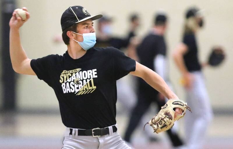 Sycamore players warm up during practice Thursday afternoon in the field house at the school.