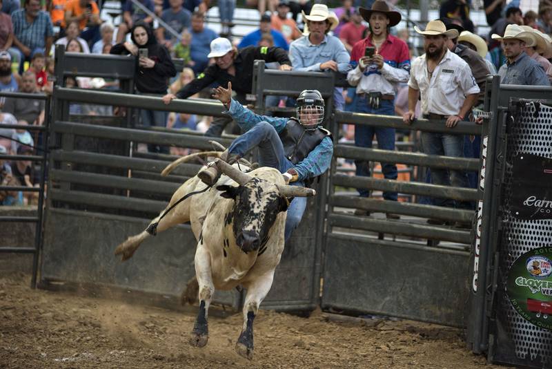 Jonah Bass of Rock Falls competes  in the Rice Bull Riding Rodeo at the 2021 Carroll County Fair.