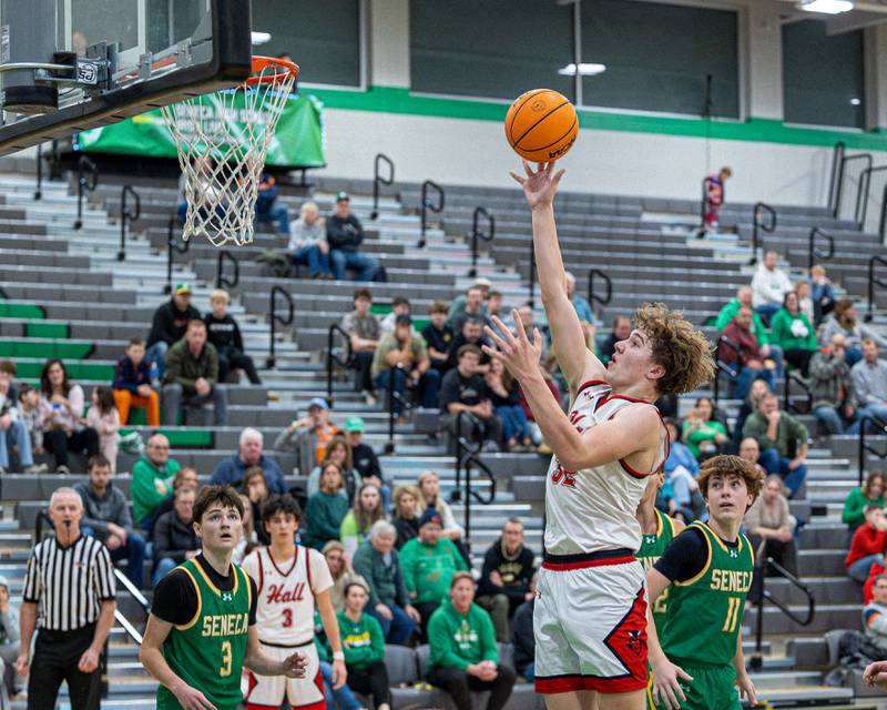 Chace Sterling (32) of Hall lays ball up during game in the Shipyard Showdown on Tuesday, December 23, 2025 at Seneca High School in Seneca.