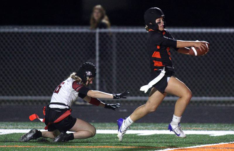 McHenry’s Gabriele Grasser runs the ball for a touchdown against Antioch in IHSA Regional Title Game action flag football at McHenry High School in McHenry on Thursday, Oct. 10, 2024.