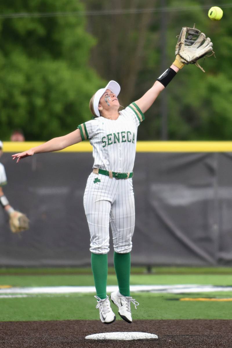 Seneca's Alyssa Zellers leaps to field a throw at second base during the Class 2A Seneca Sectional championship against Beecher Friday, May 30, 2025.