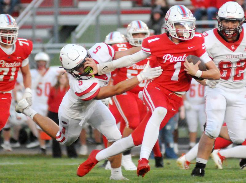 Ottawa quarterback Mark Munson stiff arms Streator defender Tj Horton on Friday, Sept. 5, 2025 at King Field.